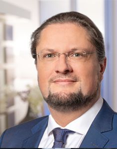 Dr.