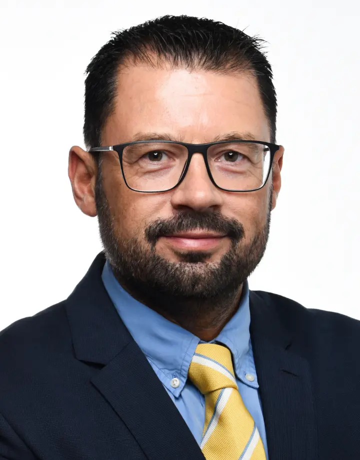 Dr.